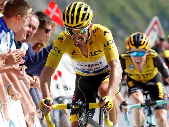 Julian Alaphilippe holds the yellow jersey (Reuters)