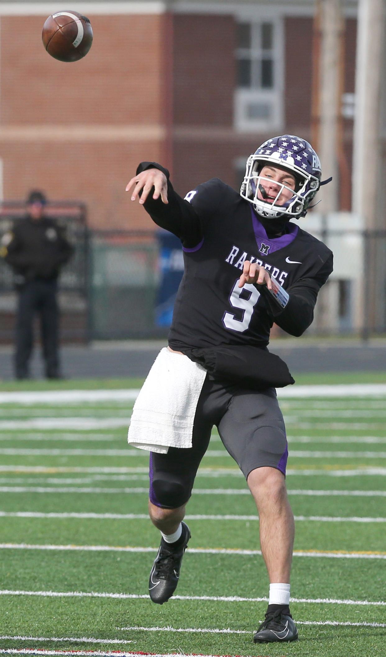 Mount Union quarterback Braxton Plunk targets a receiver during last year's playoff game against Washington & Lee.