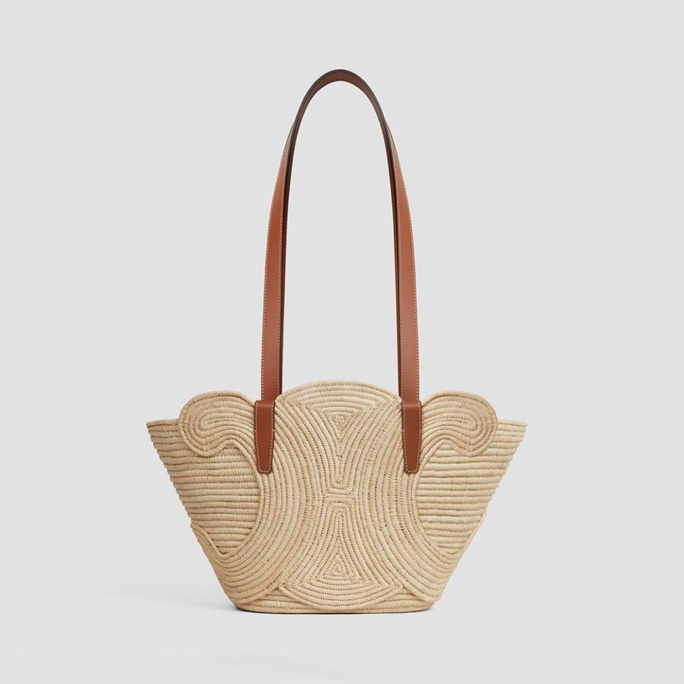 <p><a href="https://www.celine.com/en-us/celine-shop-women/handbags/classic-panier/celine-classic-panier-small-braided-triomphe-in-raffia-and-calfskin-117022FWB.04LU.html" rel="nofollow noopener" target="_blank" data-ylk="slk:Shop Now;elm:context_link;itc:0;sec:content-canvas" class="link ">Shop Now</a></p><p>Classic Panier Small Braided Triomphe Handbag</p><p>celine.com</p><p>$1650.00</p>