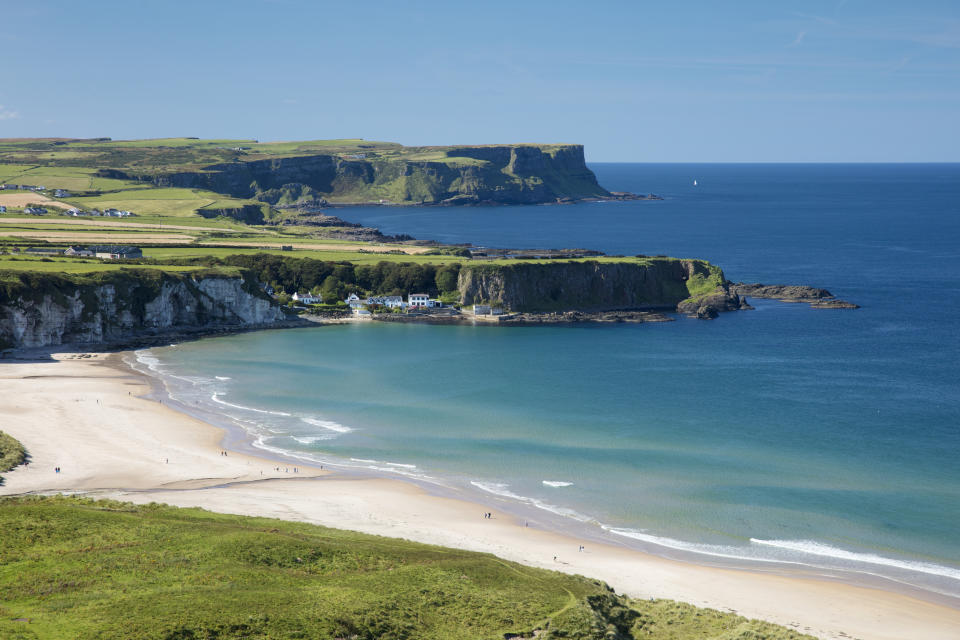 View across White Park Bay and Portbraddan, Causeway Coast, County Antrim, Northern Ireland. (Getty Images)