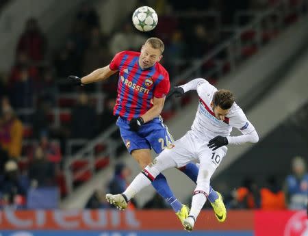 Football Soccer - PFC CSKA Moscow v Bayer Leverkusen - UEFA Champions League Group Stage - Group E - CSKA Stadium, Moscow, Russia - 22/11/16. CSKA Moscow's Vasili Berezutski in action against Bayer Leverkusen's Hakan Calhanoglu. REUTERS/Maxim Zmeyev