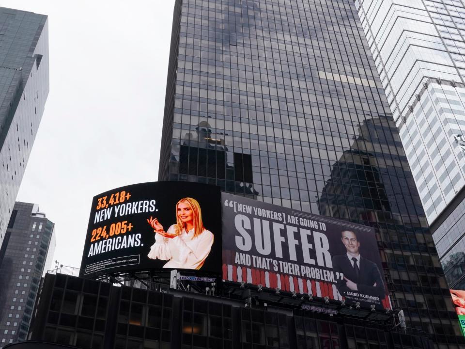 A billboard by The Lincoln Project is seen in Times Square on 25 October  2020 in New York City ((AFP via Getty Images))