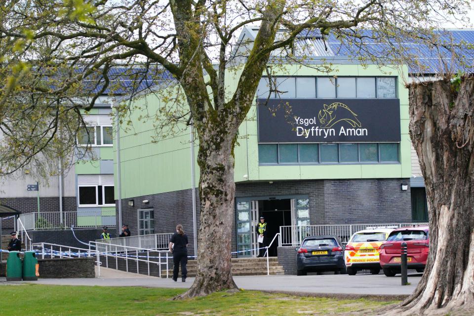 Police at Amman Valley school, in Ammanford (Ben Birchall/PA) (PA Wire)