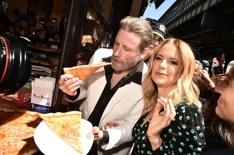 John Travolta and Kelly Preston at Lenny's Pizza. (Getty Images)