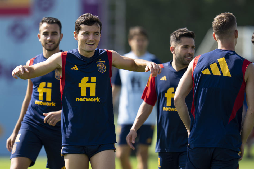 Spain's Hugo Guillamon works out with teammates during a training session at Qatar University, in Doha, Qatar, Tuesday, Nov. 29, 2022. Spain will play its first final match in Group E in the World Cup against Japan on Dec. 1. (AP Photo/Julio Cortez)