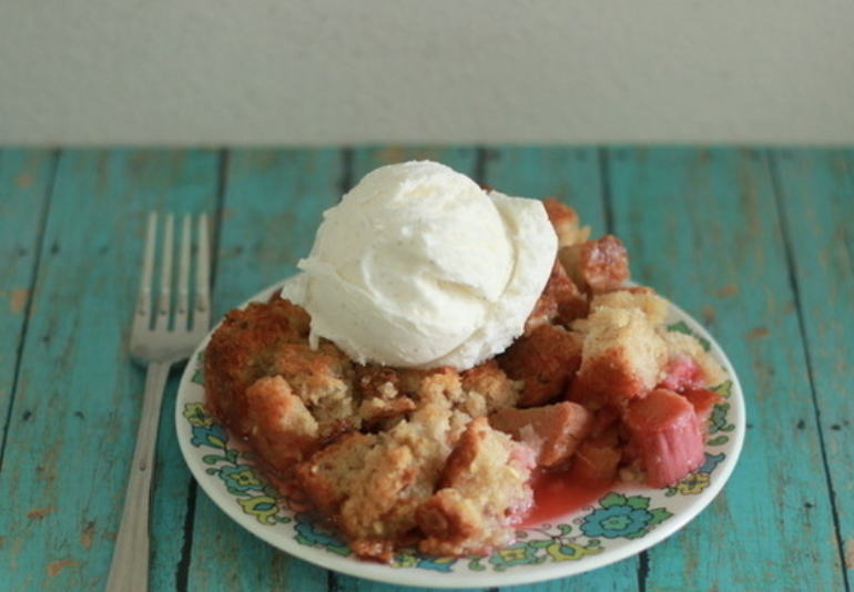 Cubes of bread go for a happy little swim in melted butter and honey before getting baked on top of the fruit. Recipe: Honey Rhubarb Brown Betty