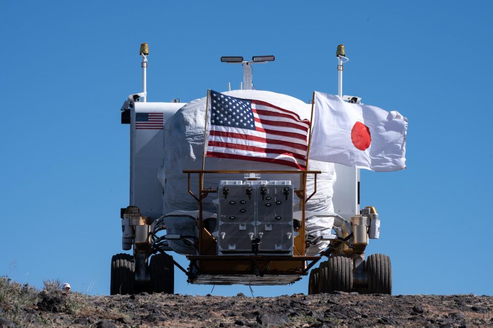 Lucien Junkin (NASA Space Exploration Vehicle chief engineer) drives the Artemis Rover before the start of a news briefing on Oct. 24, 2022, at NASA's Desert Research and Technology Studies (Deserts RATS) Artemis' Rover Mission Simulations site at Black Point Lava Flow, located 40 miles north of Flagstaff.