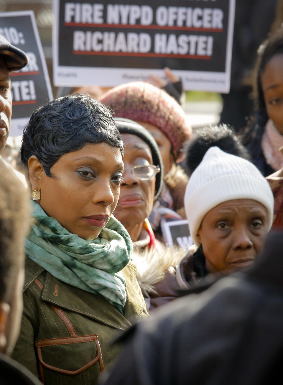 Political officials, civil rights activists and families of police shooting victims, join Constance Malcolm, left, mother of Ramarley Graham, and family members at a press conference outside police headquarters, Thursday Jan. 19, 2017, in New York. A disciplinary trial is underway for NYPD officer Richard Haste, who shot and killed the unarmed 18-year-old Graham in the bathroom of his New York City apartment. (AP Photo/Bebeto Matthews)