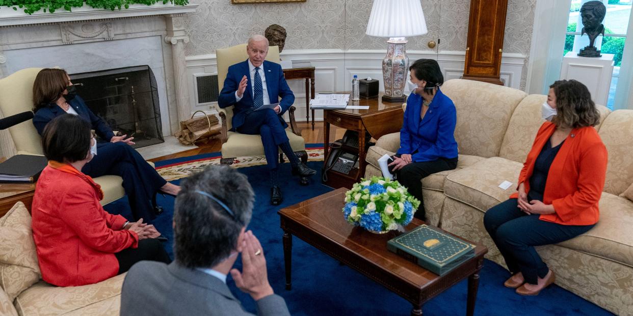 President Joe Biden speaks with Vice President Kamala Harris, Sen. Mazie Hirono, Mark Takano, Rep. Judy Chu, and Rep. Grace Meng during a meeting with members of the Congressional Asian Pacific American Caucus Executive Committee at the White House in Washington.