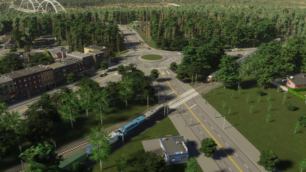  roundabout-with-level-crossing-and-small-housing-district 