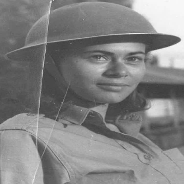 A woman in the '60s in a uniform