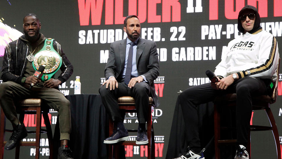 Deontay Wilder and Tyson Fury, pictured here discussing their bout at a press conference.