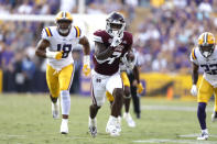 Mississippi State running back Jo'quavious Marks (7) runs the ball past LSU defensive end BJ Ojulari (18) to score a touchdown during the first half of an NCAA college football game in Baton Rouge, La., Saturday, Sept. 17, 2022. (AP Photo/Tyler Kaufman)