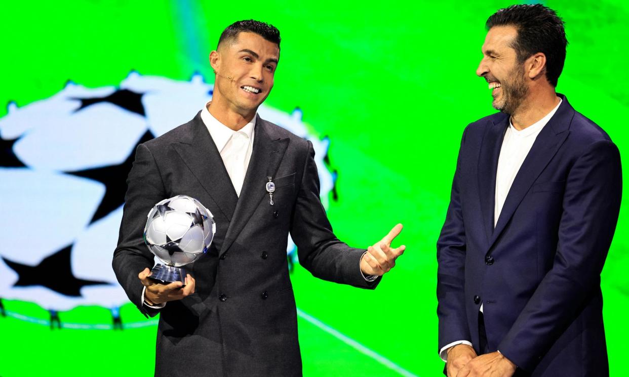 <span>Cristiano Ronaldo and Gianluigi Buffon get in on Uefa’s big shindig.</span><span>Photograph: Valéry Hache/AFP/Getty Images</span>