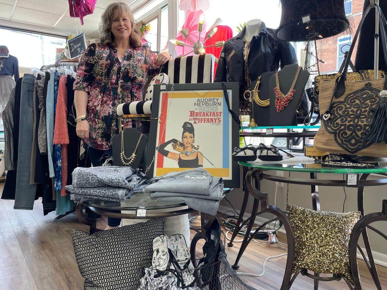 The Garment District Resale owner Brandy Wimmer set up a display of merchandise that reminds her of Audrey Hepburn's style in "Breakfast at Tiffany's" at her new Howell consignment store, shown Tuesday, March 14, 2023.