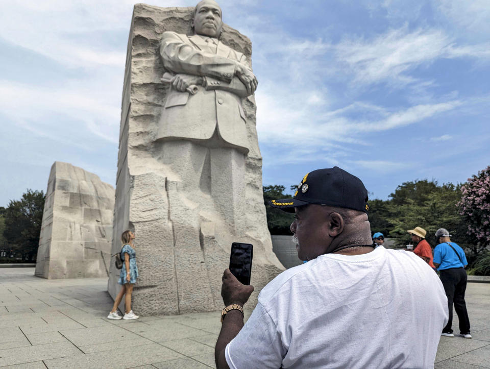 Tommie Babbs, 72, looks at the Martin Luther King Jr. memorial in Washington on Aug. 11, 2023. Babbs, an academic advisor for the State University of New York at Buffalo who served more than three decades in the military, believes progress has been made toward achieving the dream that the Rev. Dr. Martin Luther King Jr. envisioned on the steps of the memorial nearly 60 years ago at the March on Washington for Jobs and Freedom. (AP Photo/Nathan Ellgren)