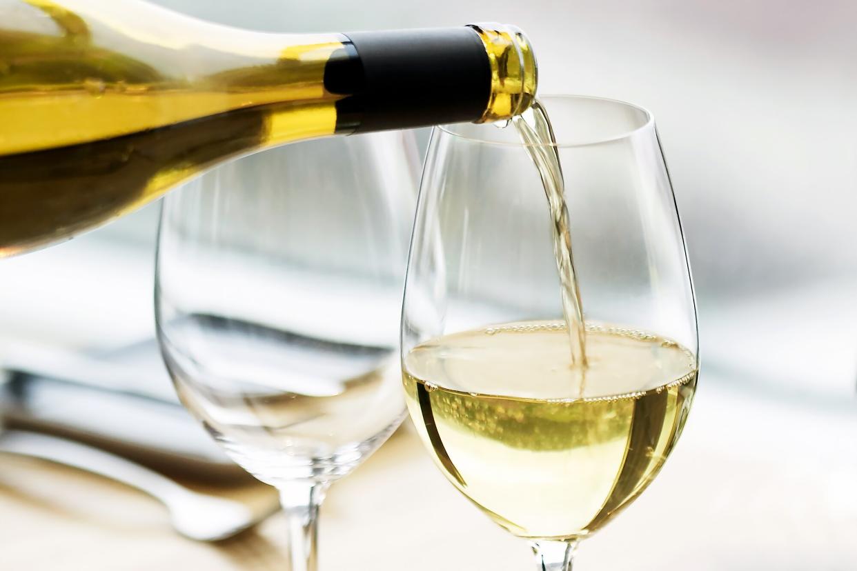 Chardonnay being poured into a glass