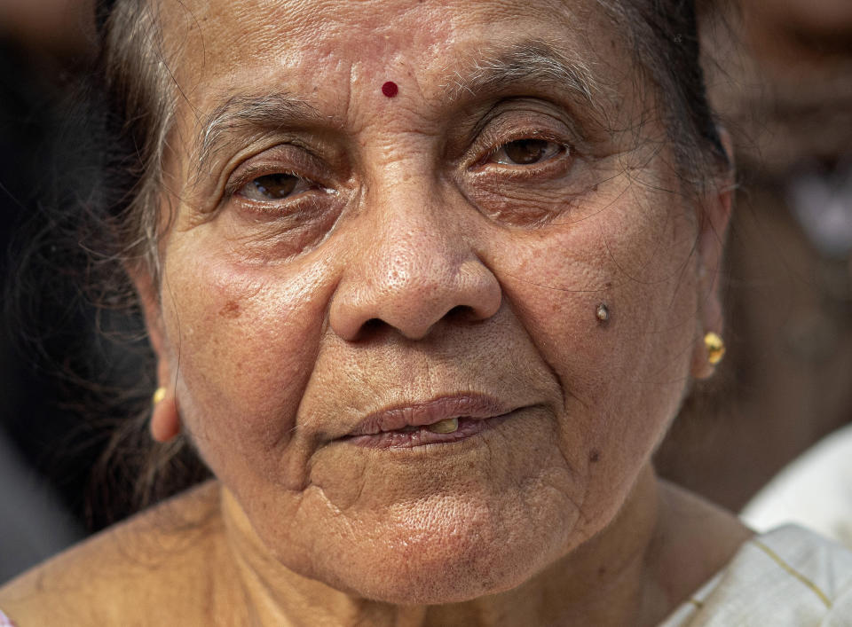In this Monday, Dec. 23, 2019, photo, Bina Bora, 70, participates in a protest against the Citizenship Amendment Act in Gauhati, India. Tens of thousands of protesters have taken to India’s streets to call for the revocation of the law, which critics say is the latest effort by Narendra Modi’s government to marginalize the country’s 200 million Muslims. Bora asked why the government is forcefully implementing an act that will destroy unity in the country. (AP Photo/Anupam Nath)