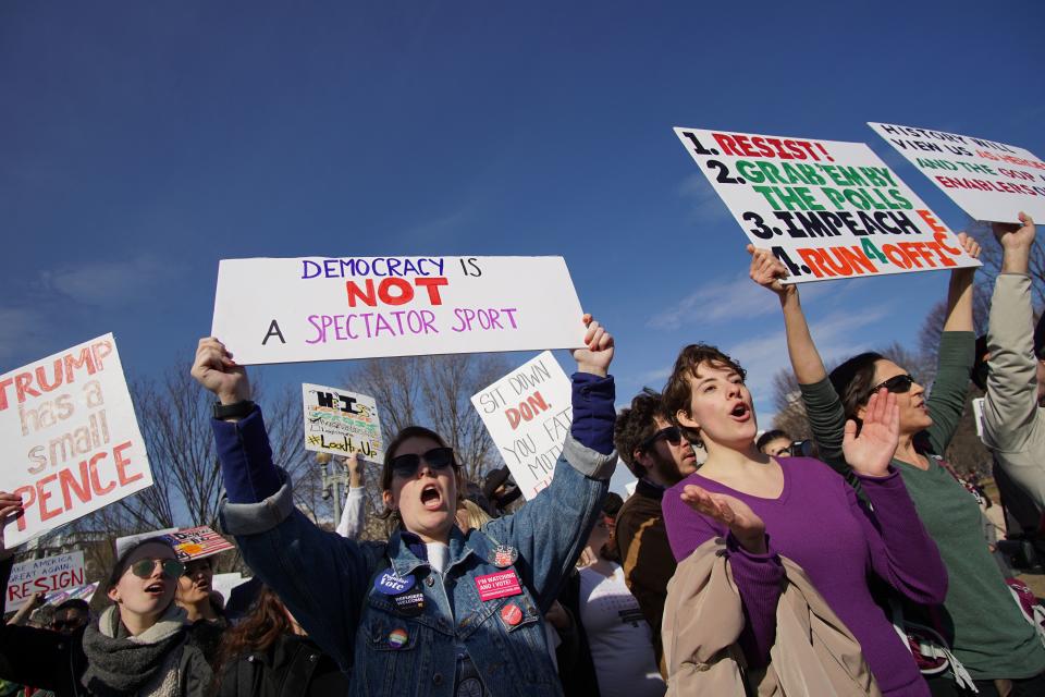 Activists shout slogans during the People’s March on Washington in front of the White House this month. (Photo: Mandel Ngan/AFP/Getty Images)