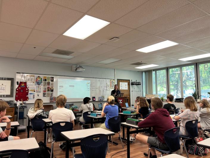 Granville Middle School Teacher James Browder discusses general reminders with students prior to releasing them to work on their projects during a new experiential learning course implemented at the school.