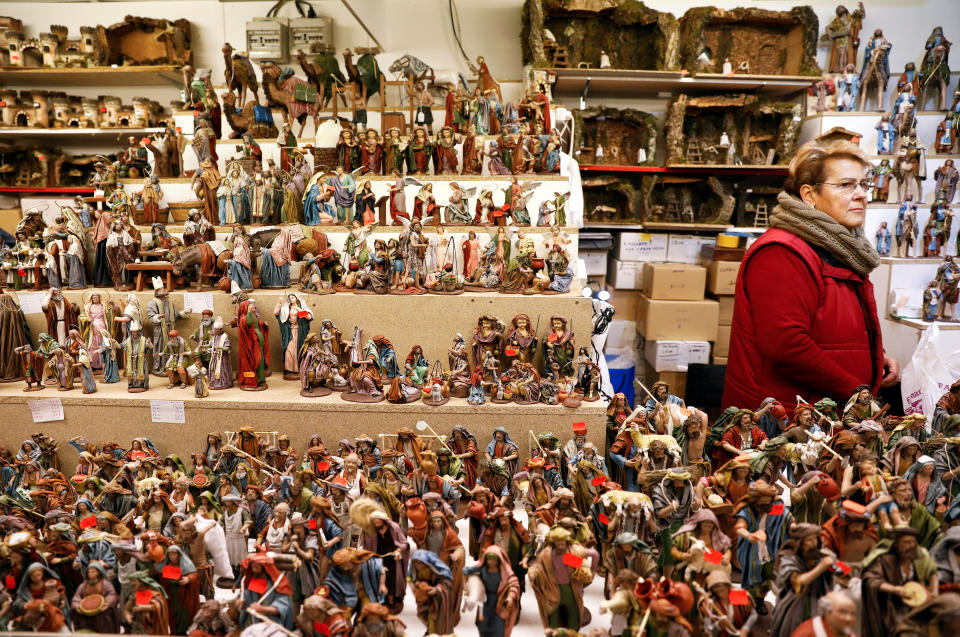 Nativity scene figures for sale are seen at a Christmas market stall at the Plaza Mayor in Madrid, Spain, November 27, 2017.  REUTERS/Paul Hanna