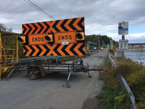 The bridge in Mira Gut was torn down in November 2017 after it was deemed unsafe by the Department of Transportation.  (Gary Mansfield/CBC - image credit)