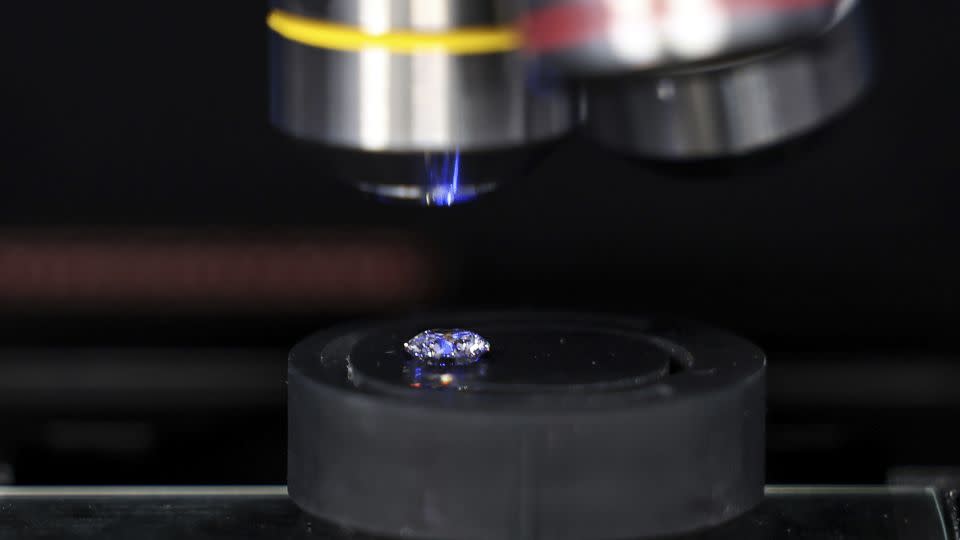 First developed in the 1980s, lab-grown diamonds are produced by exposing pure carbon to a large amount of heat and pressure in a metal cube. - Valeria Mongelli/Bloomberg/Getty Images/File