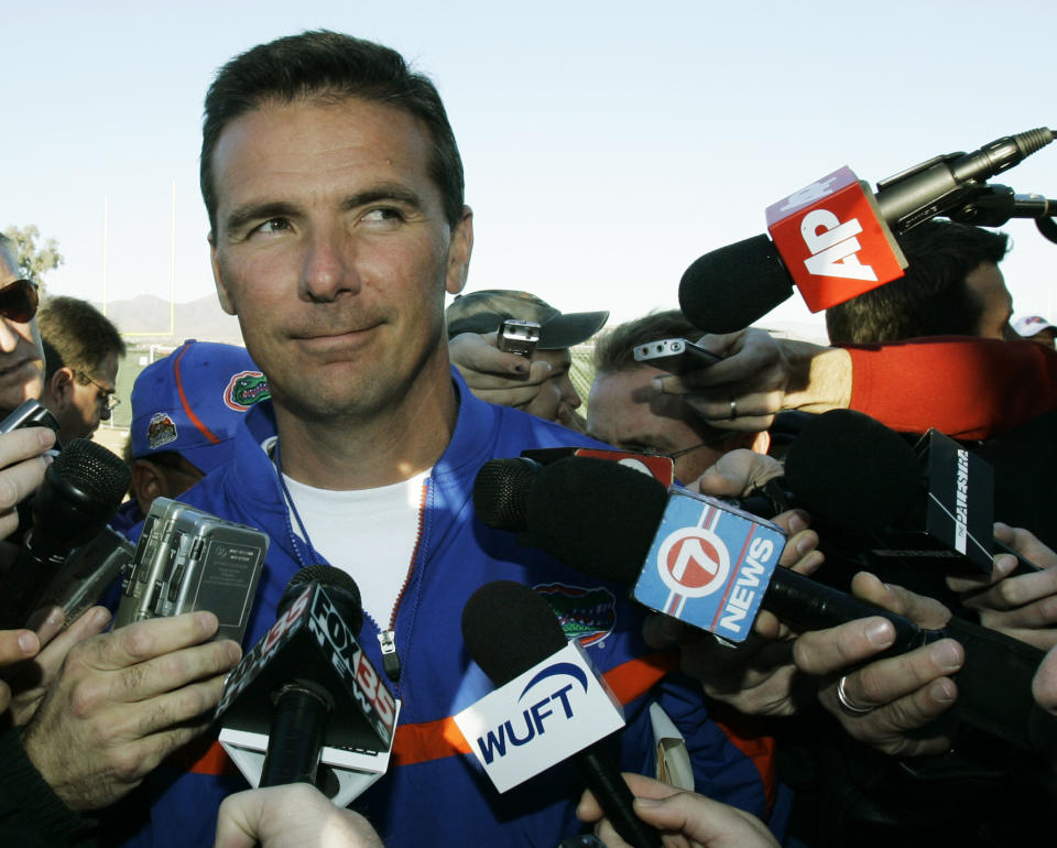 FILE - Florida NCAA college football head coach Urban Meyer talks to reporters after practice in Scottsdale, Ariz., ahead of the BCS Championship game against Ohio State, in this Jan. 8, 2007, file photo. A person familiar with the search says Urban Meyer and the Jacksonville Jaguars are working toward finalizing a deal to make him the team's next head coach. The person spoke to The Associated Press on the condition of anonymity Thursday, Jan. 14, 2021, because a formal agreement was not yet in place. (AP Photo/Ted S. Warren, File)