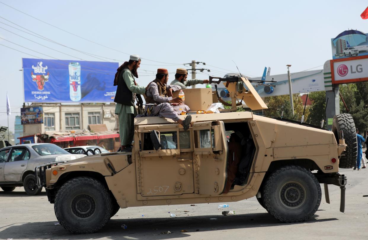 Taliban in trucks in Kabul