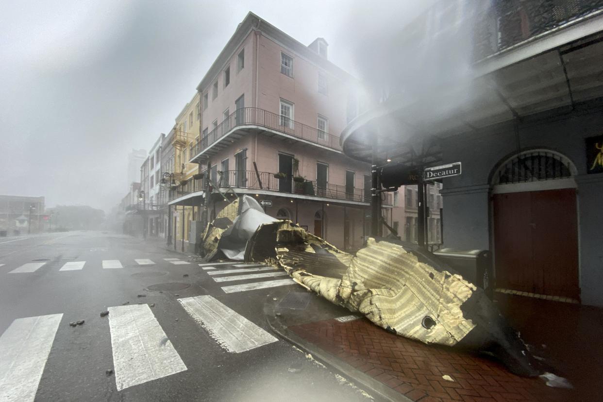 A section of a building's roof is seen after being blown off during rain and winds in the French Quarter of New Orleans, Louisiana on Aug. 29, 2021, during Hurricane Ida.