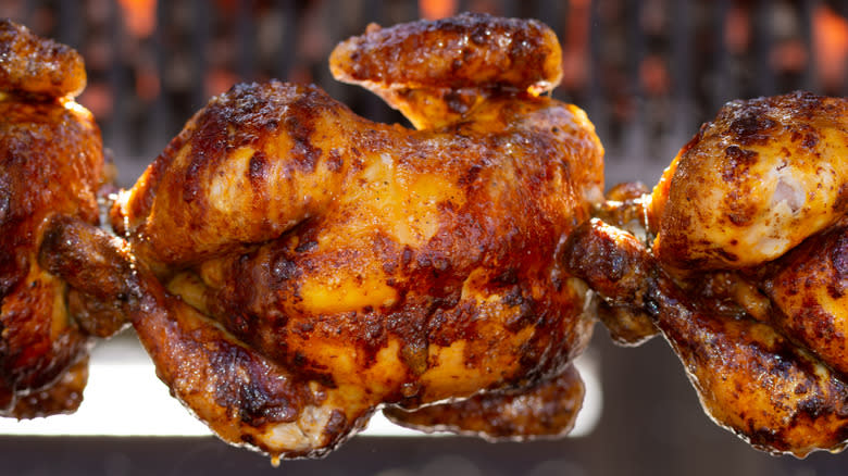 rotisserie chickens on skewer