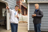 Andrew Myers, Republican candidate for the Minnesota House of Representatives District 45A, talks to voter Joe Galler about the neighborhood they both live in while door-knocking along the eastern bank of Lake Minnetonka in Excelsior, Minn. (AP Photo/Nicole Neri)