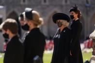 <p>The Duchess of Cornwall and Duchess Kate stand outside St George's chapel before the ceremonial funeral procession.</p>