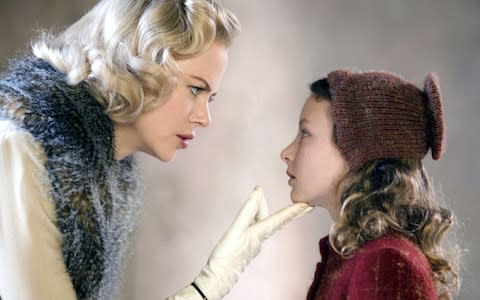 Dakota Blue Richards and Nicole Kidman on The Golden Compass - Credit: Ronald Grant