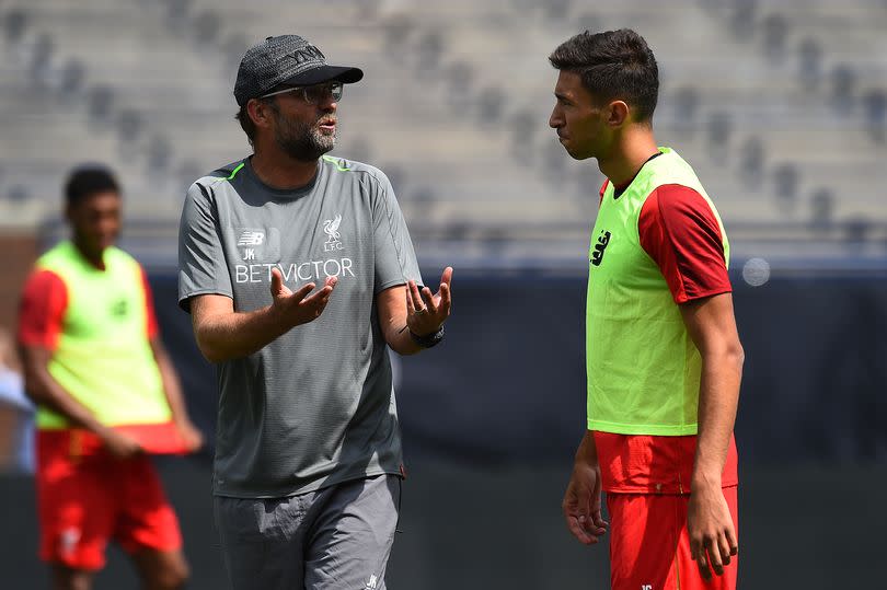 Jurgen Klopp talking with Marko Grujic