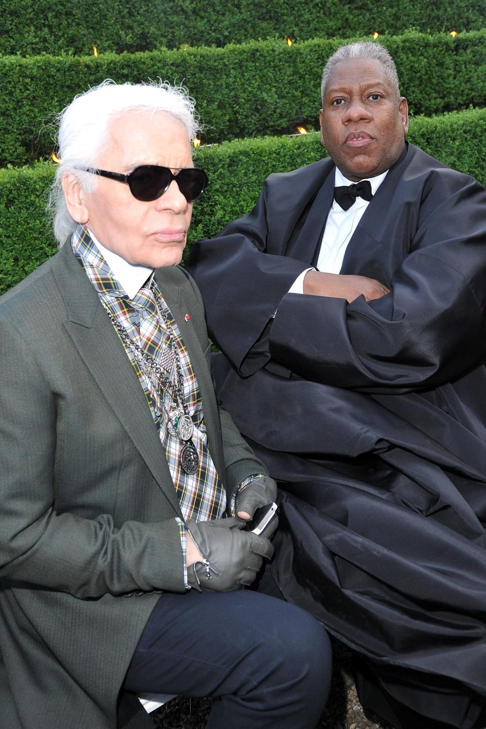 Karl Lagerfeld, left, and André Leon Talley pose during the Chanel 2012-13 Cruise Collection at Chateau de Versailles on May 14, 2012, in Versailles, France.