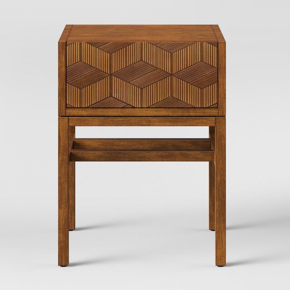 Get it from <a href="https://www.target.com/p/tachuri-geometric-front-accent-table-brown-opalhouse-153/-/A-53021656" target="_blank">Target</a>.&nbsp;