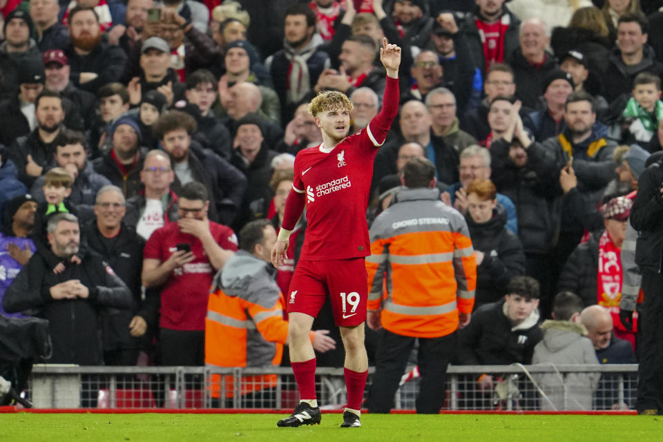 Liverpool's Harvey Elliott celebrates after scoring his side's fourth goal during the English Premier League soccer match between Liverpool and Luton Town, at Anfield stadium in Liverpool, England, Wednesday, Feb. 21, 2024. (AP Photo/Jon Super)
