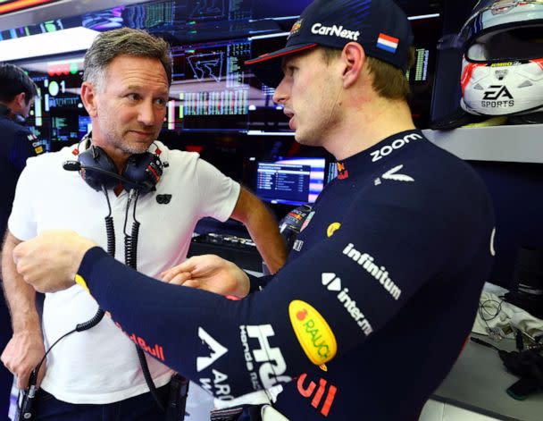 PHOTO: Red Bull Racing Team Principal Christian Horner talks with Max Verstappen of the Netherlands and Oracle Red Bull Racing during day two of F1 Testing at Bahrain International Circuit on Feb. 24, 2023 in Bahrain, Bahrain. (Mark Thompson/Getty Images, FILE)