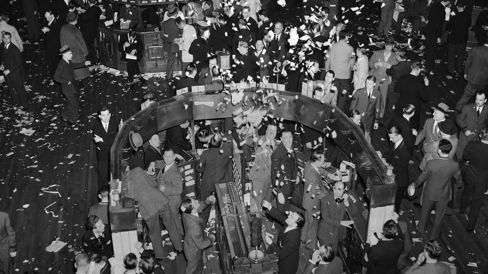 This was the scene on the floor of the New York Stock Exchange, April 7, 1939 as the market closed an active session after the Good Friday holiday. Weary clerks produced this shower of paper at the closing gong. - AP