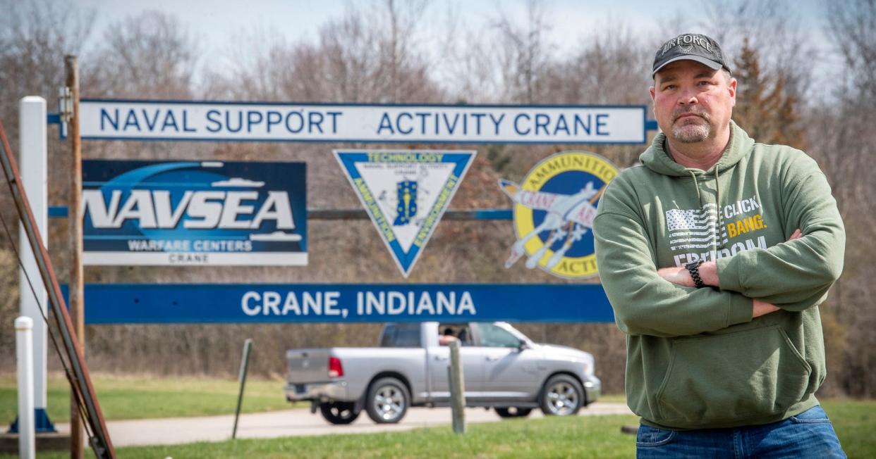 Maj. Rick Ward, former safety chief at Crane Army Ammunition Activity, poses in front of the sign across the street of the Naval Support Activity Crane Visitors Center on Tuesday, March 12, 2024.