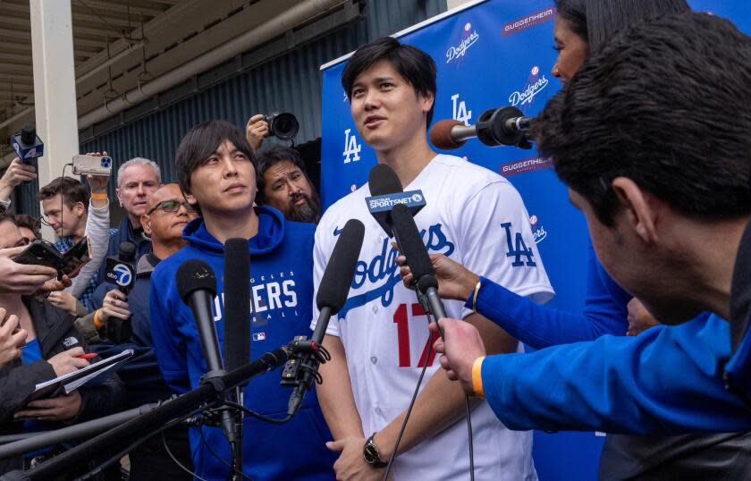 Los Angeles, CA - February 03: Dodger Shohei Ohtani talks with media at DodgerFest 2024.