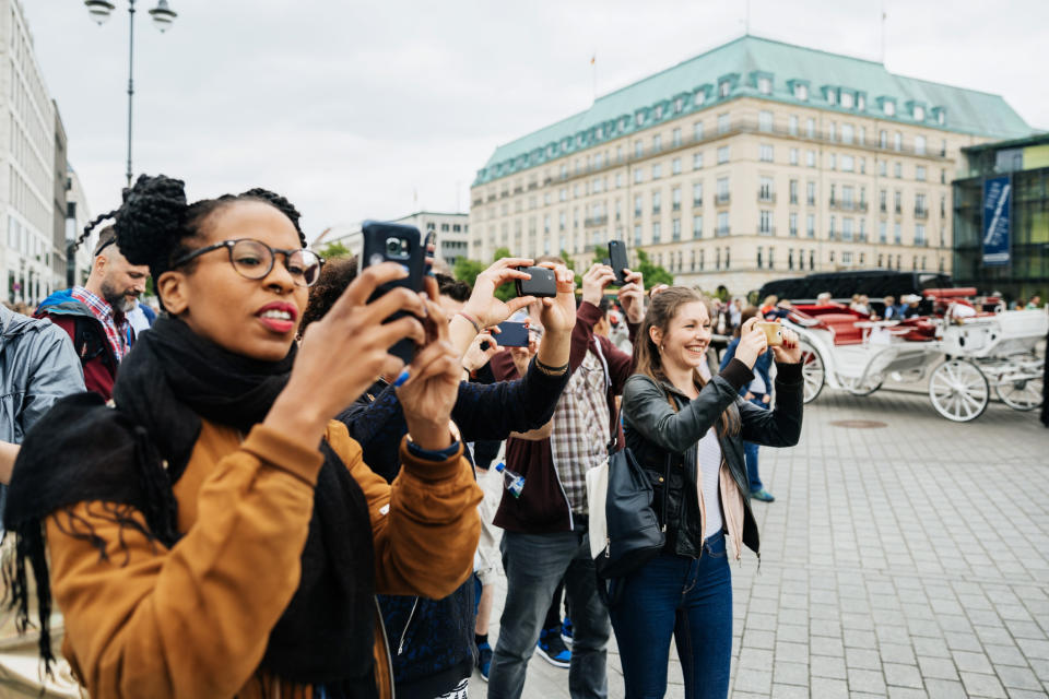 People taking photos on their phones