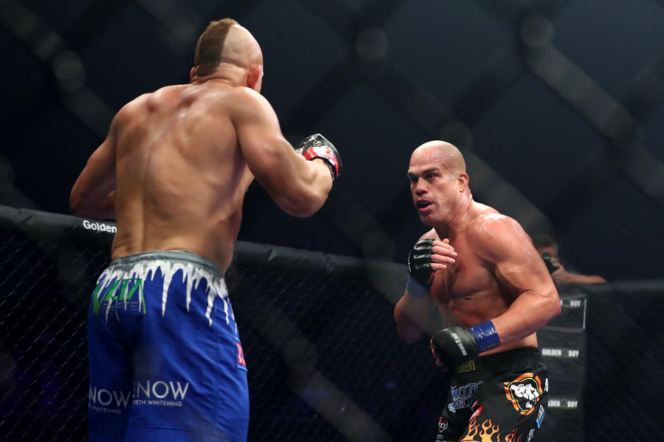 INGLEWOOD, CA - NOVEMBER 24:  Tito Ortiz and Chuck Liddell spar off in the octagon in the first round during the Light Heavyweight bout at The Forum on November 24, 2018 in Inglewood, California. (Photo by Joe Scarnici/Getty Images)