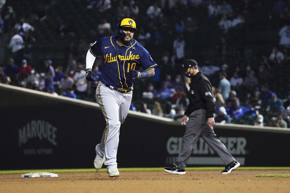 Milwaukee Brewers' Omar Narvaez runs the bases after hitting a three-run home run against the Chicago Cubs during the seventh inning of a baseball game, Monday, April 5, 2021, in Chicago. (AP Photo/David Banks)