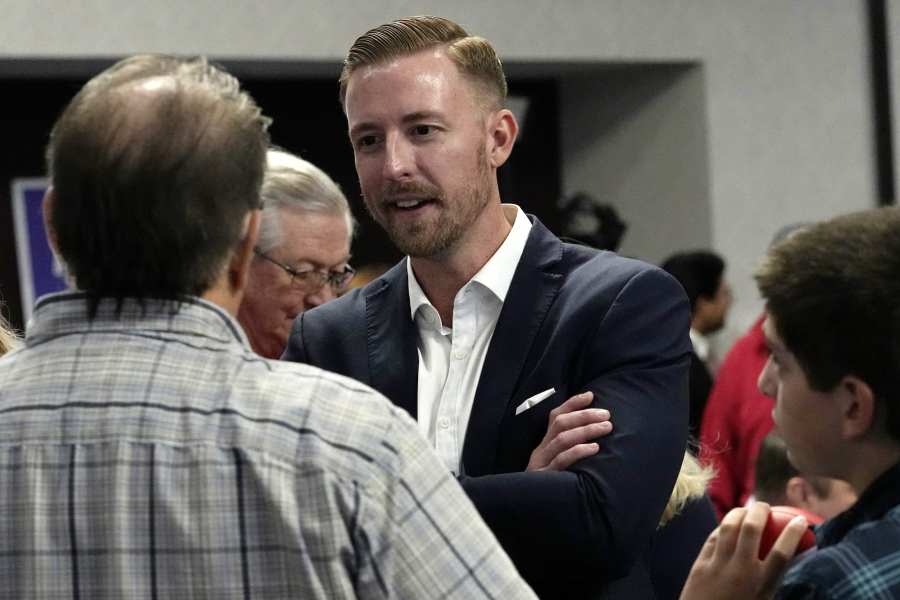 Ryan Walters, Republican candidate for state superintendent of public instruction, talks with supporters at a Republican watch party Nov. 8, 2022, in Oklahoma City. (AP Photo/Sue Ogrocki, File)
