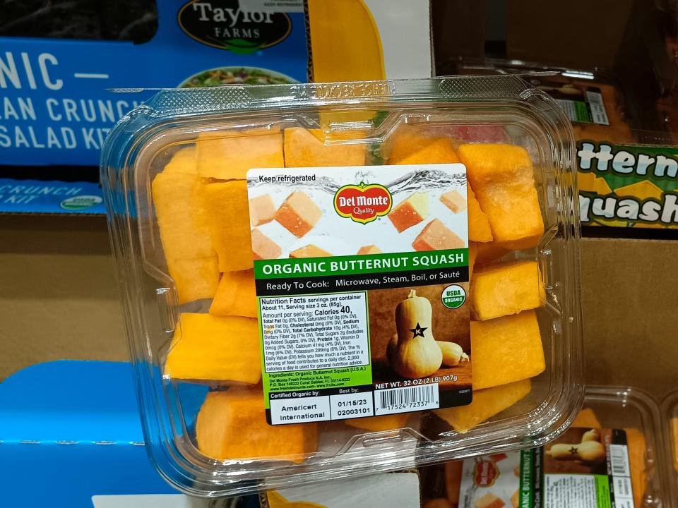 A container of chopped butternut squash