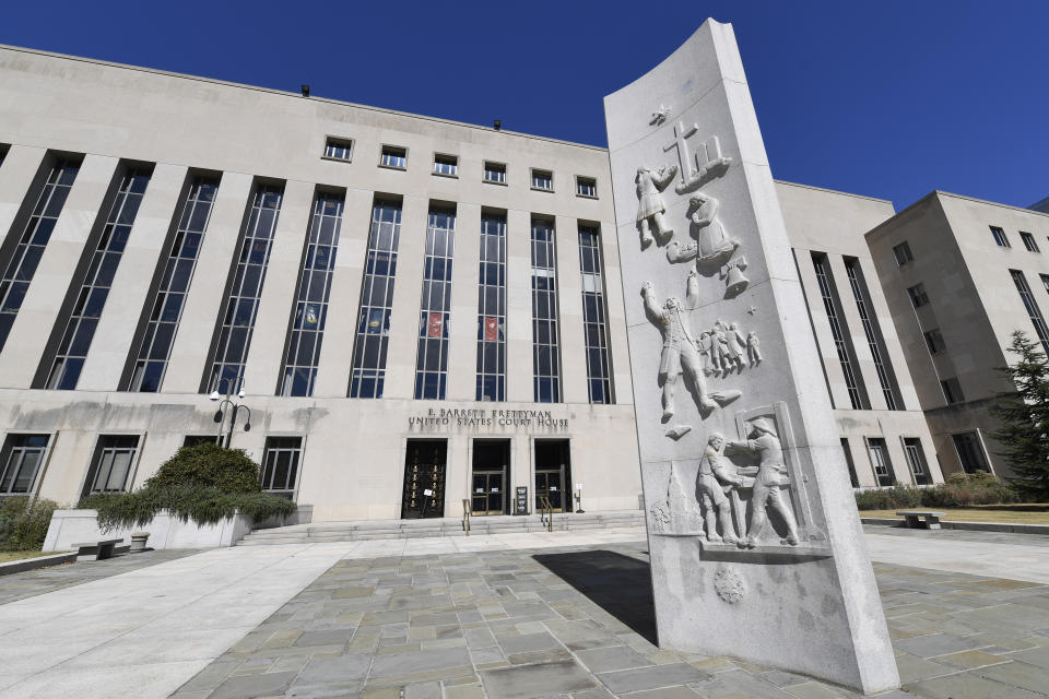 FILE - In this Oct. 11, 2019 file photo, a view of the E. Barrett Prettyman United States Courthouse in Washington. A federal judge in the District of Columbia has temporarily halted the first federal execution in 16 years as a lawsuit on how the government intends to carry it out continues. (AP Photo/Susan Walsh)