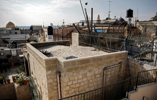 This picture taken on December 4, 2018 shows the roof of a home in the Muslim Quarter of Jerusalem's Old City that was bought by Israeli settlers