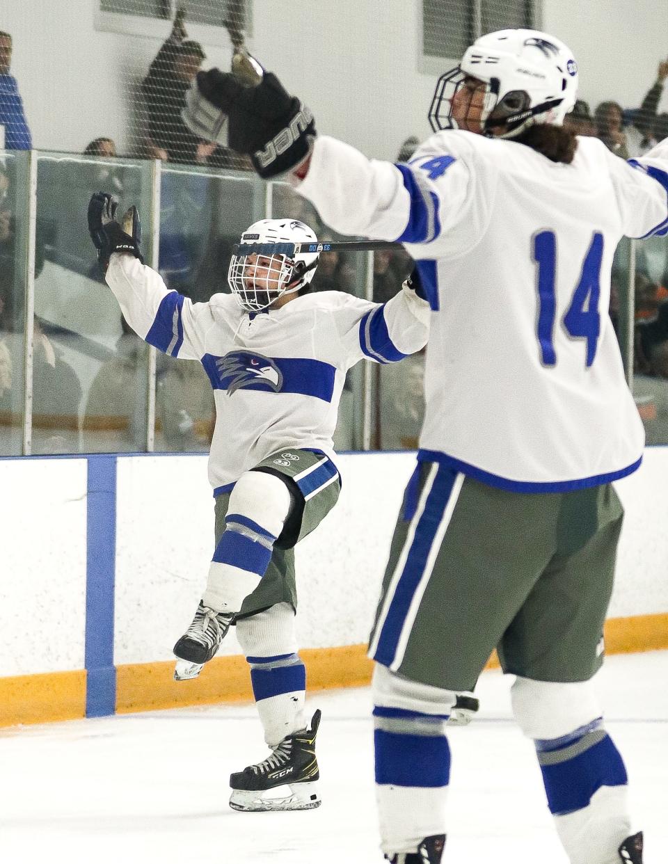 Nick Sturdevant, left, and Cam Wilbur of Southeastern/Bristol-Plymouth celebrate a goal during a game against South Shore Tech at Raynham IcePlex on Saturday, Jan. 21, 2023.